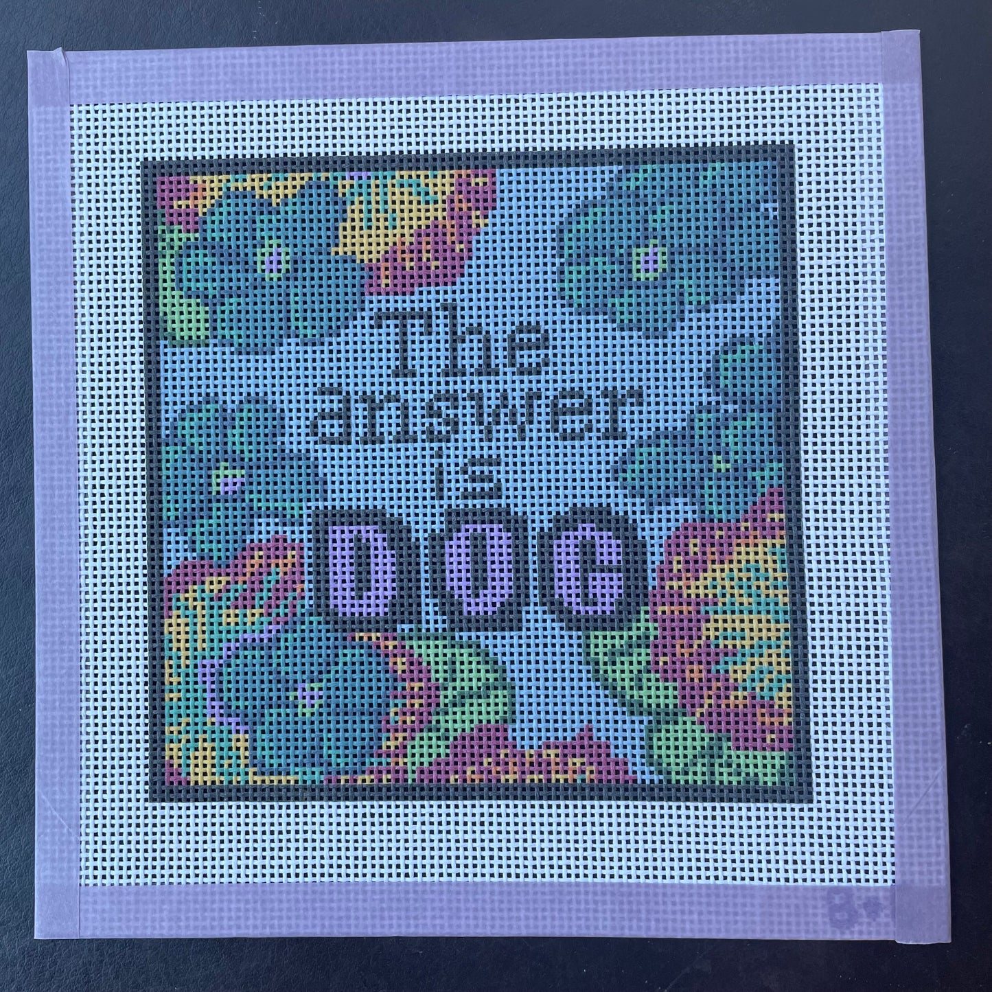 The answer is DOG Needlepoint Canvas